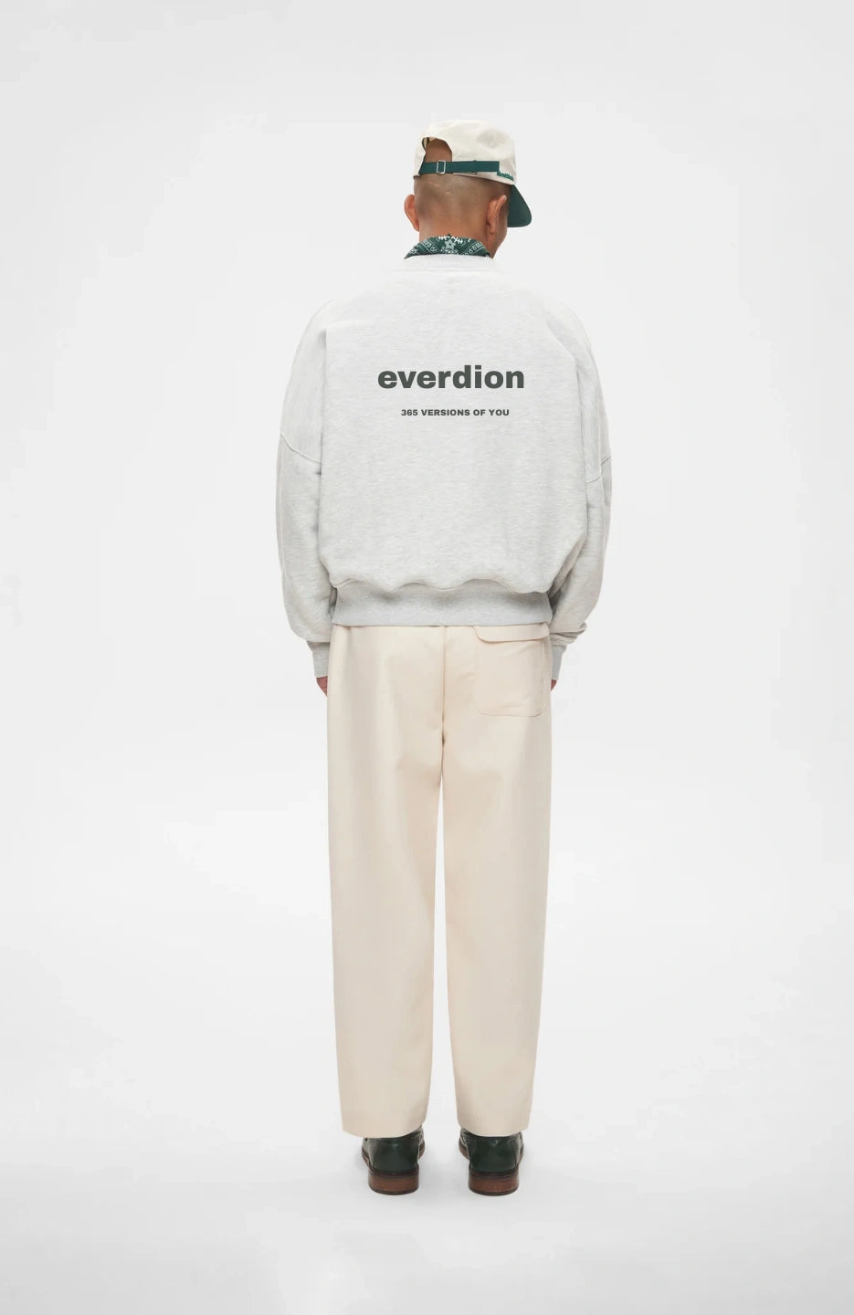 Person wearing beige trousers