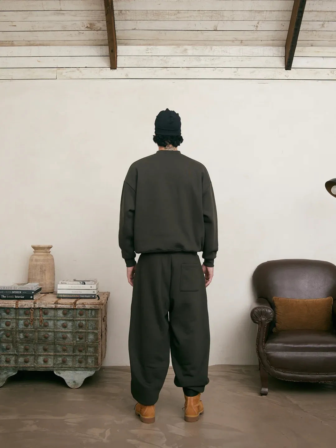 Person wearing a coffee color outfit 