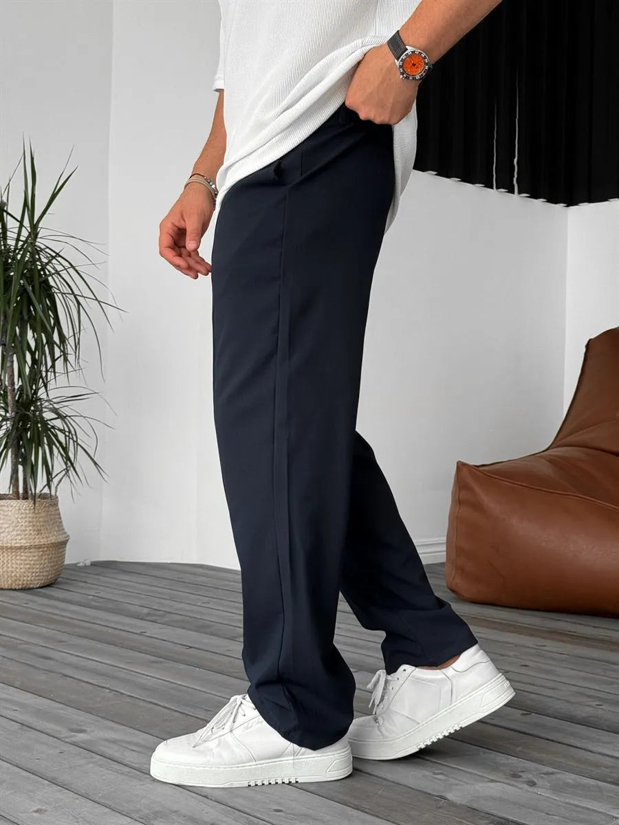Person wearing navy blue office straight fit pants 