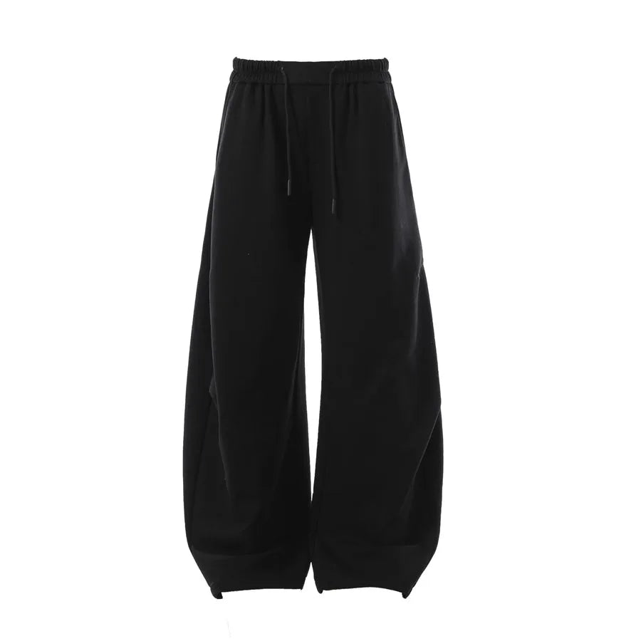 Black wide-leg sweatpants on a white background