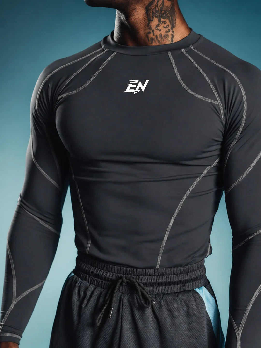 Person wearing a black Compression Full Sleeve T-shirt with a brand logo on a blue background