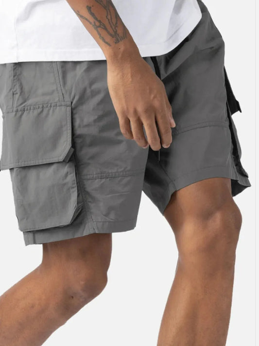 Person wearing grey Gaze Shorts