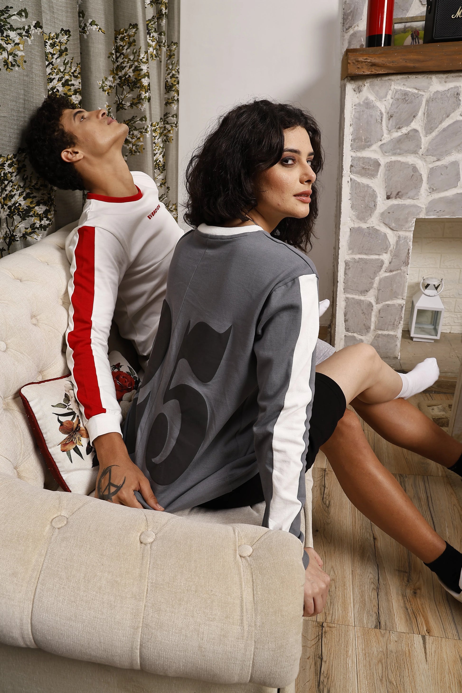 Two people wearing long sleeve sports t-shirt