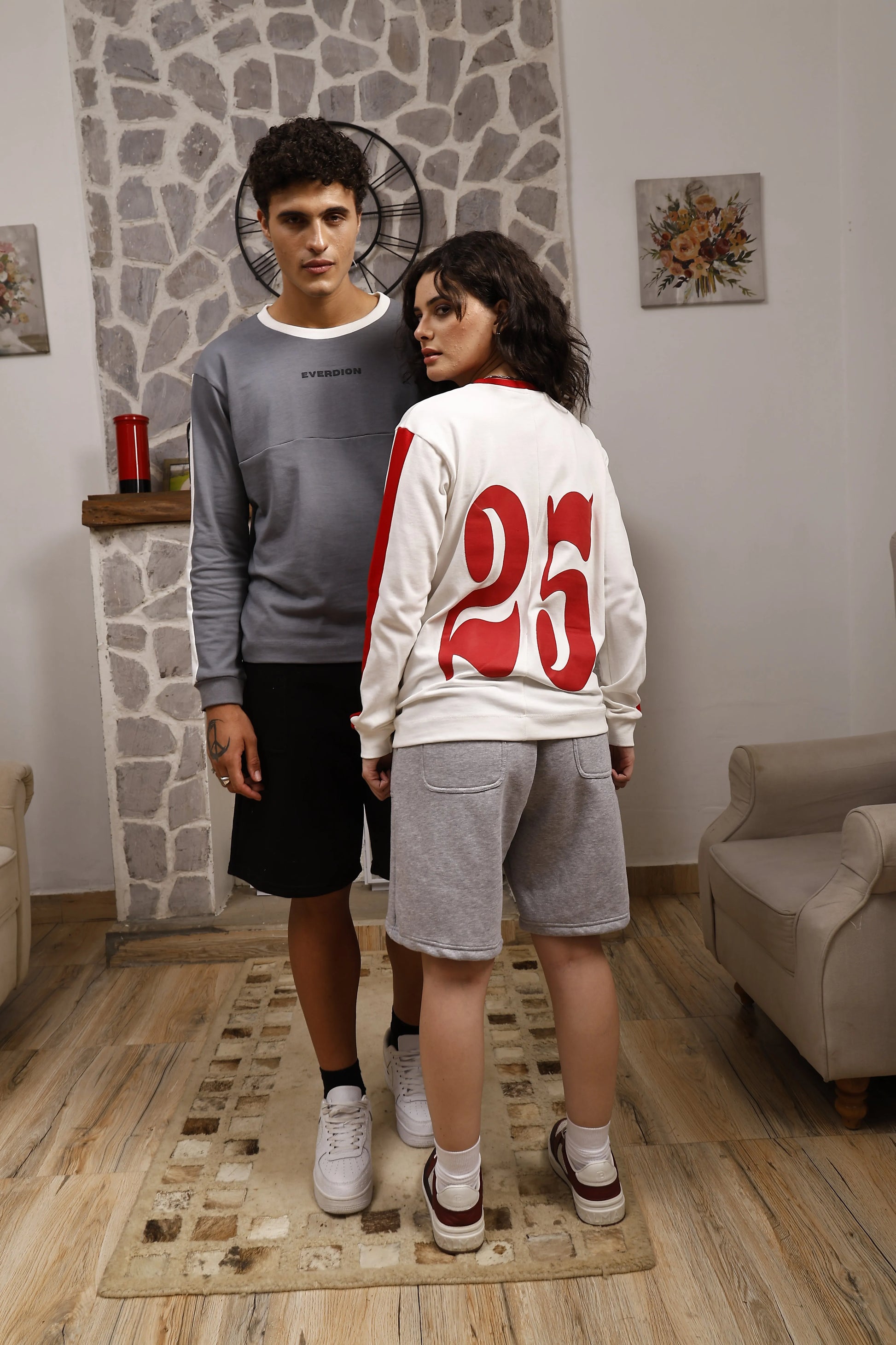 Two people wearing long sleeve sports t-shirt