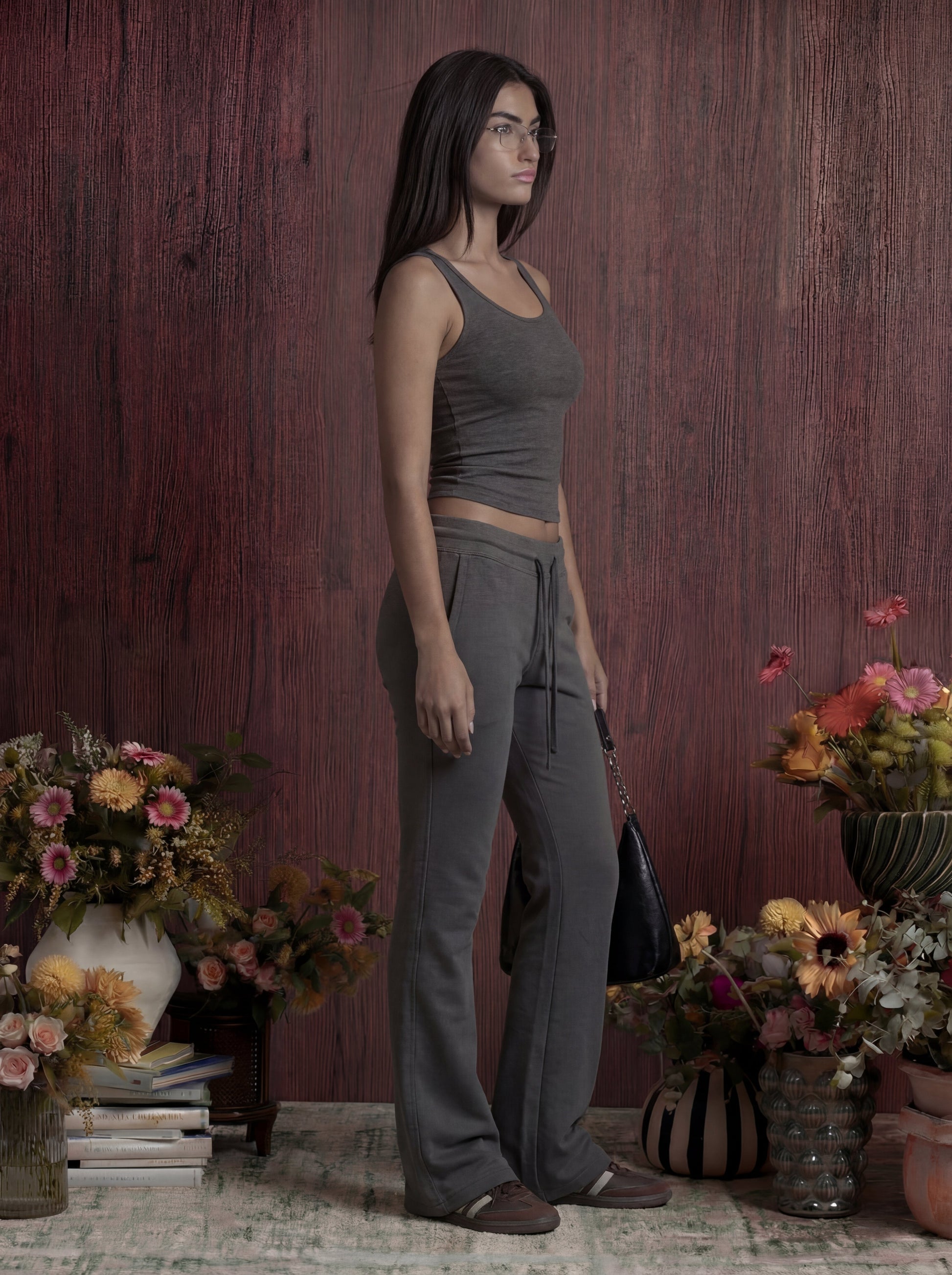 Woman wearing grey flared sweatpants
