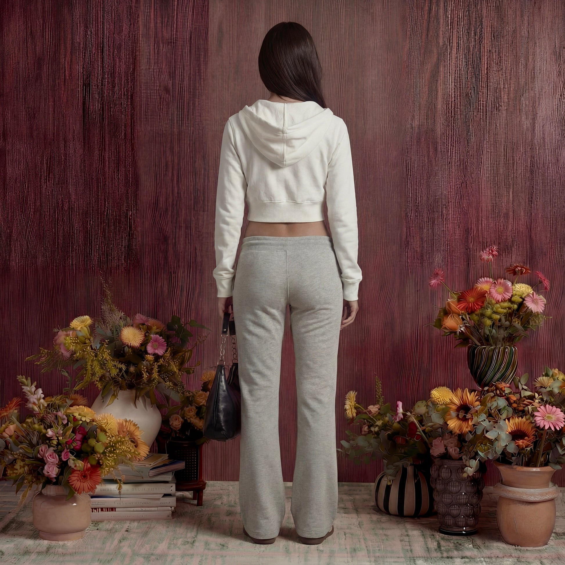 Woman wearing grey flared sweatpants