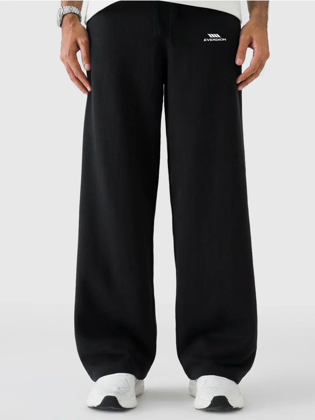 Black pants with a brand logo on a white background