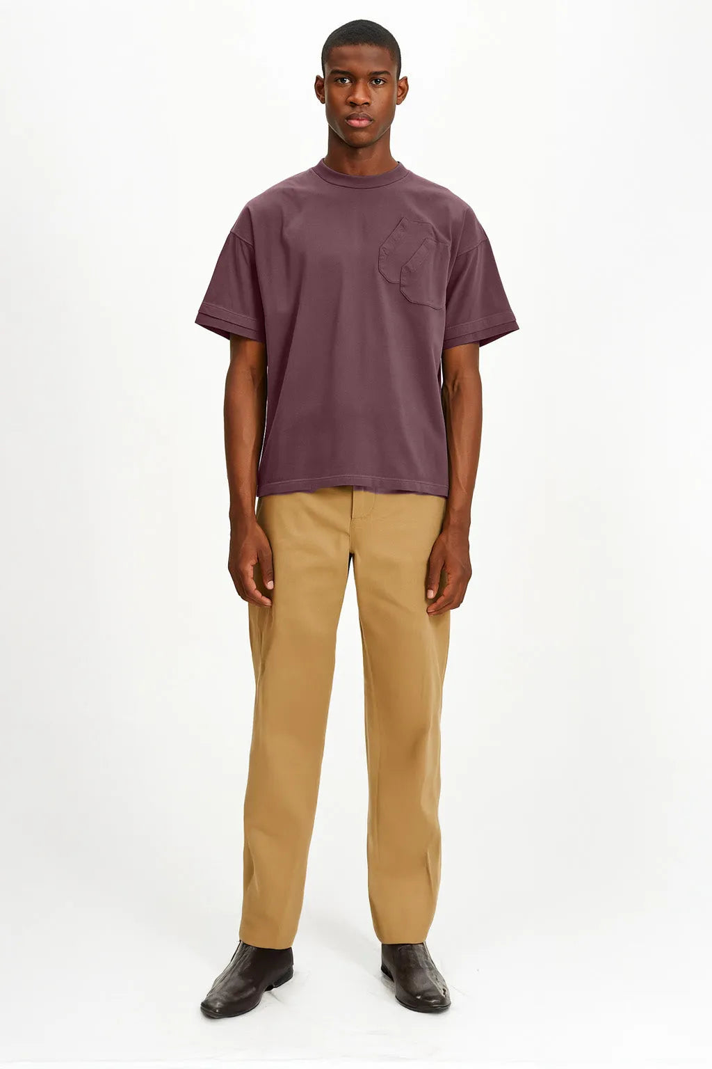 Person wearing Purple t-shirt on white background