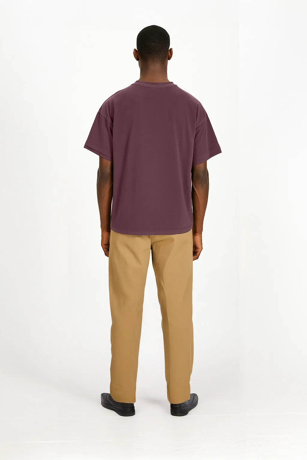 Person wearing Purple t-shirt on white background