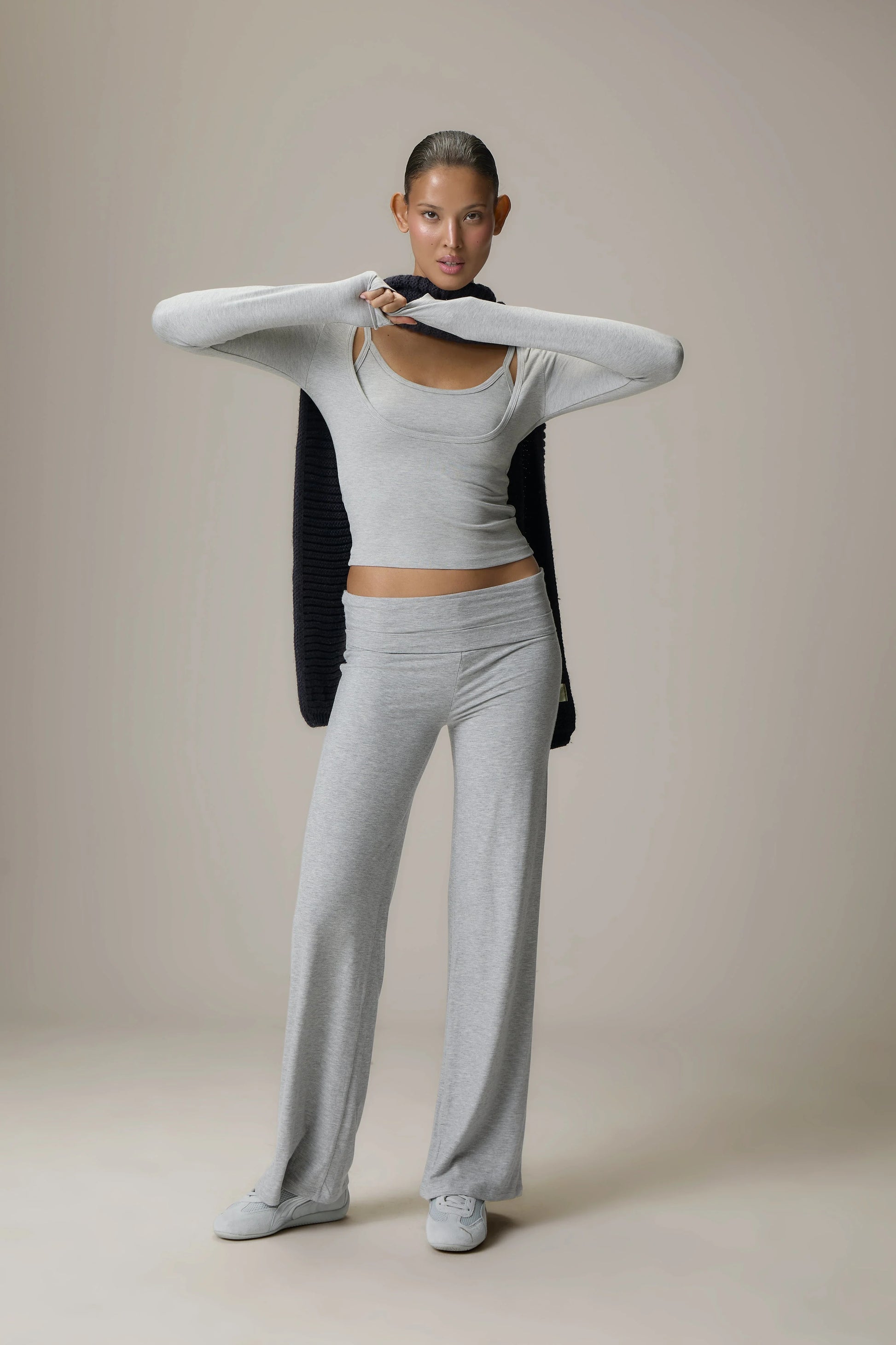 Scoop Neck Top and Fold Over Pant Grey set brings together comfort and contemporary style for everyday wear. The relaxed scoop neck top offers a soft, flattering silhouette that pairs effortlessly with the coordinating fold over pants, crafted in a lightweight, stretch fabric for all-day ease.
 