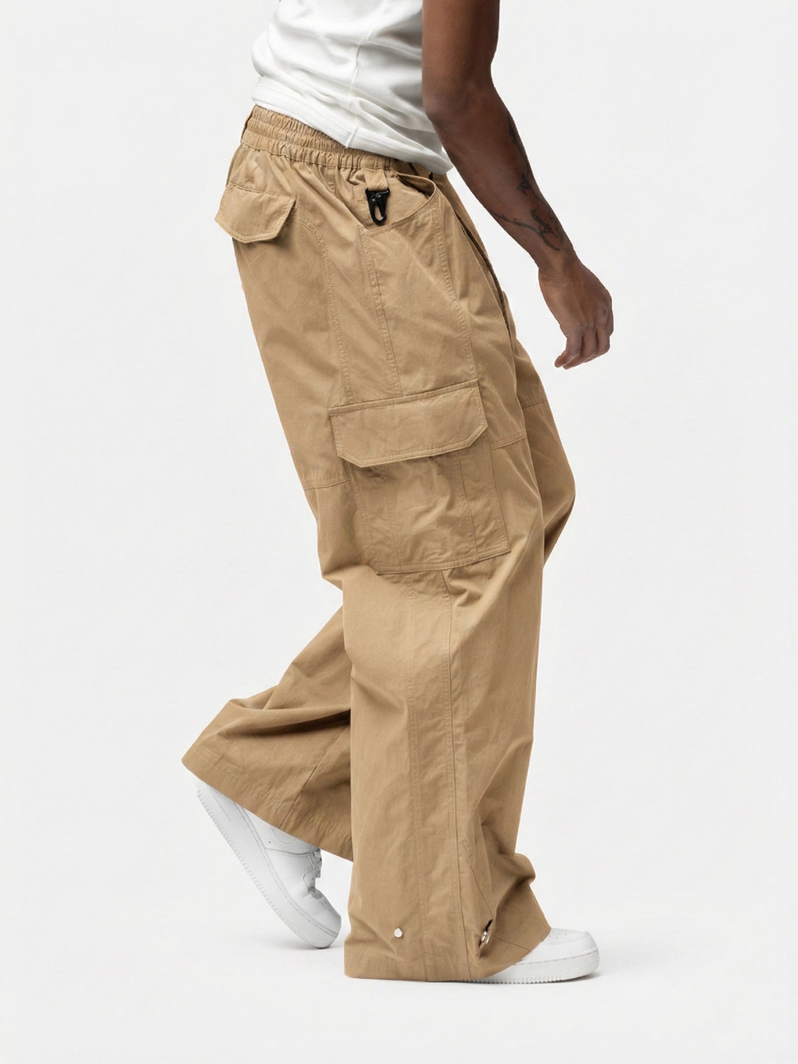 Marasis Beige Cargo Pant designed with oversized cargo pockets and a relaxed fit, it delivers raw street energy with all day comfort. Easy to style, hard to ignore, and made for days that turn into nights.