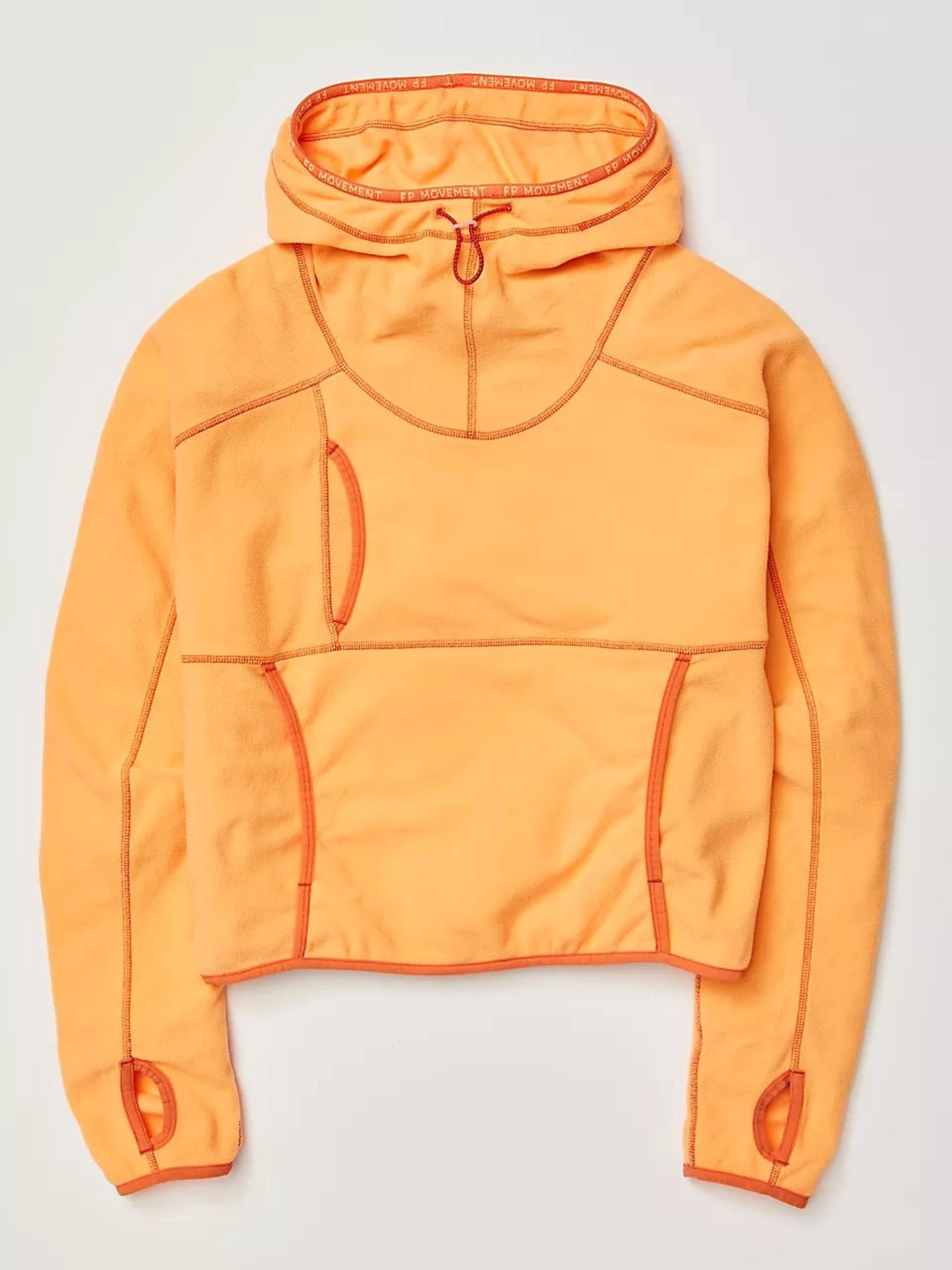 Orange hoodie on a light gray background