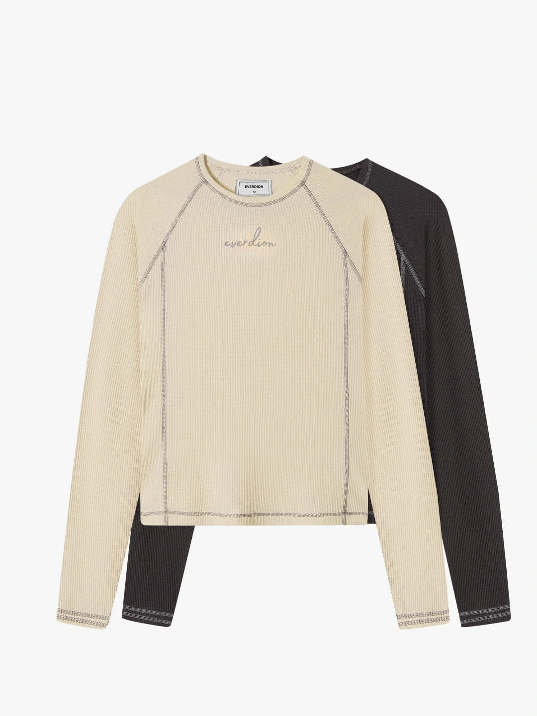 Beige and black long-sleeve shirt with 'Everdion' branding on a white background