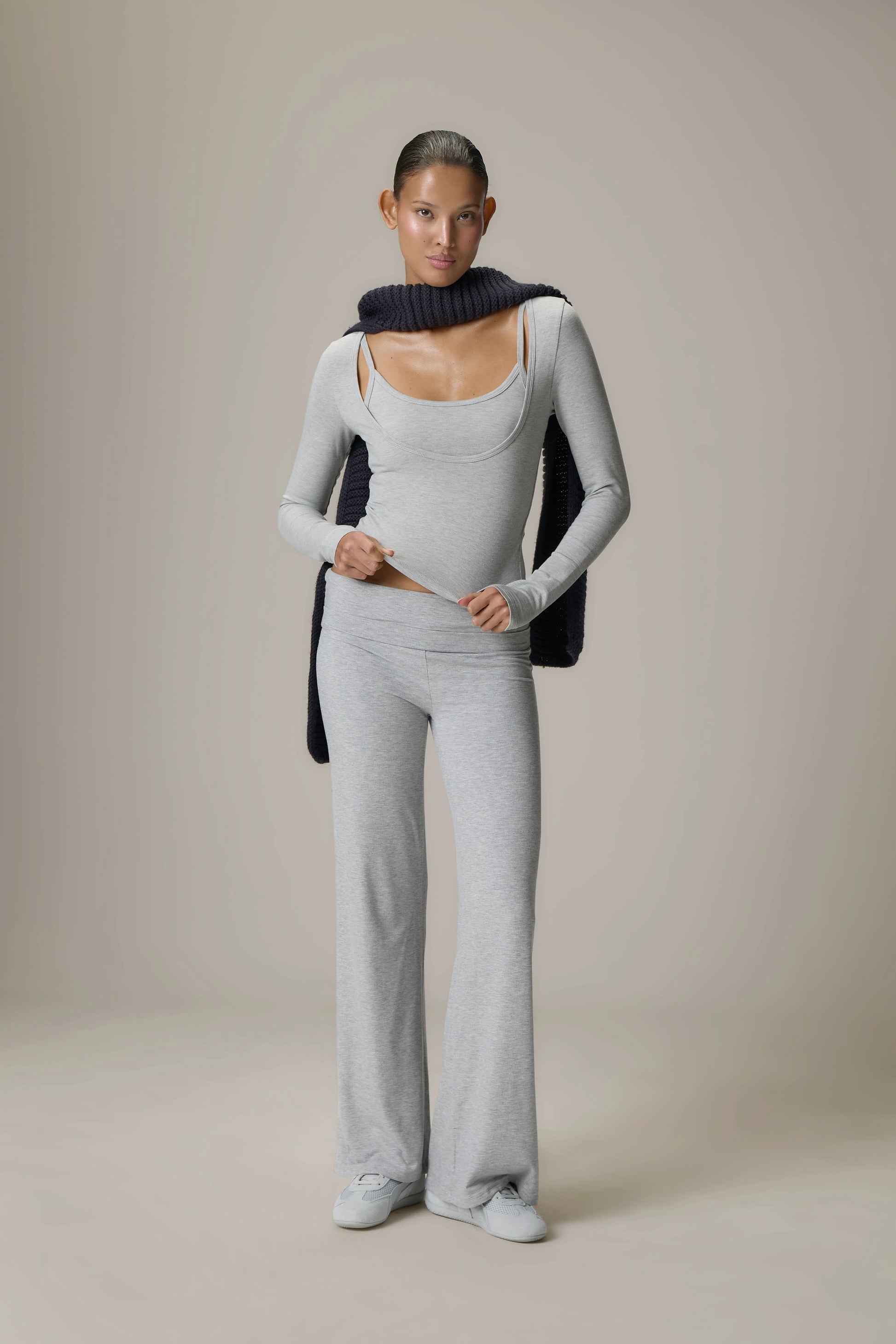 Scoop Neck Top and Fold Over Pant Grey set brings together comfort and contemporary style for everyday wear. The relaxed scoop neck top offers a soft, flattering silhouette that pairs effortlessly with the coordinating fold over pants, crafted in a lightweight, stretch fabric for all-day ease.
 
