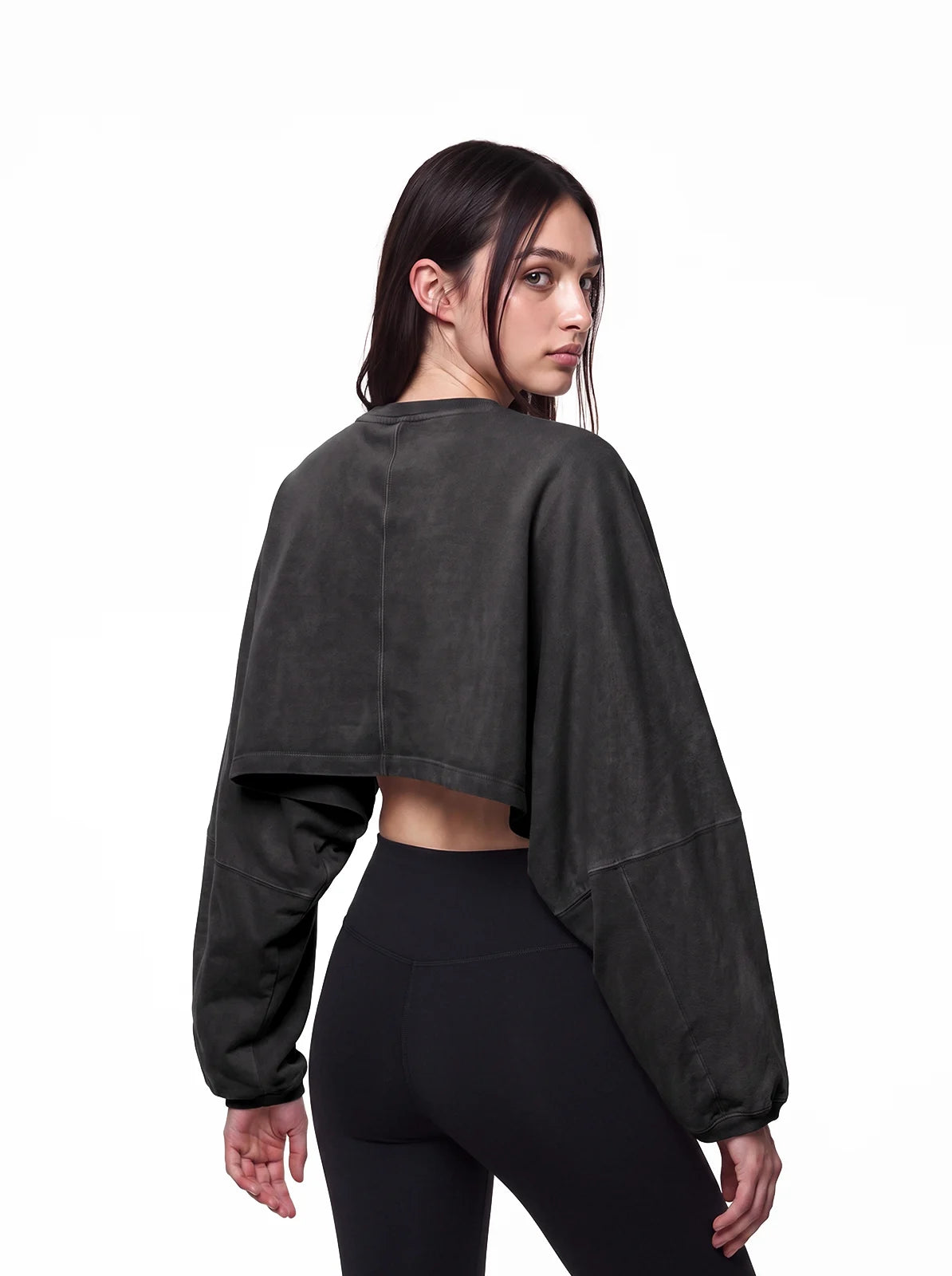 Woman wearing washed black cult cover crop tee